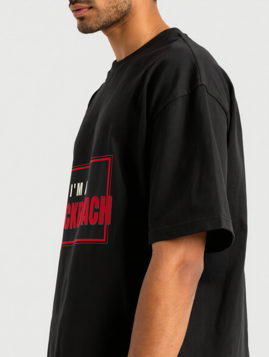 Model wearing I'm A Cockroach oversized tee, side view